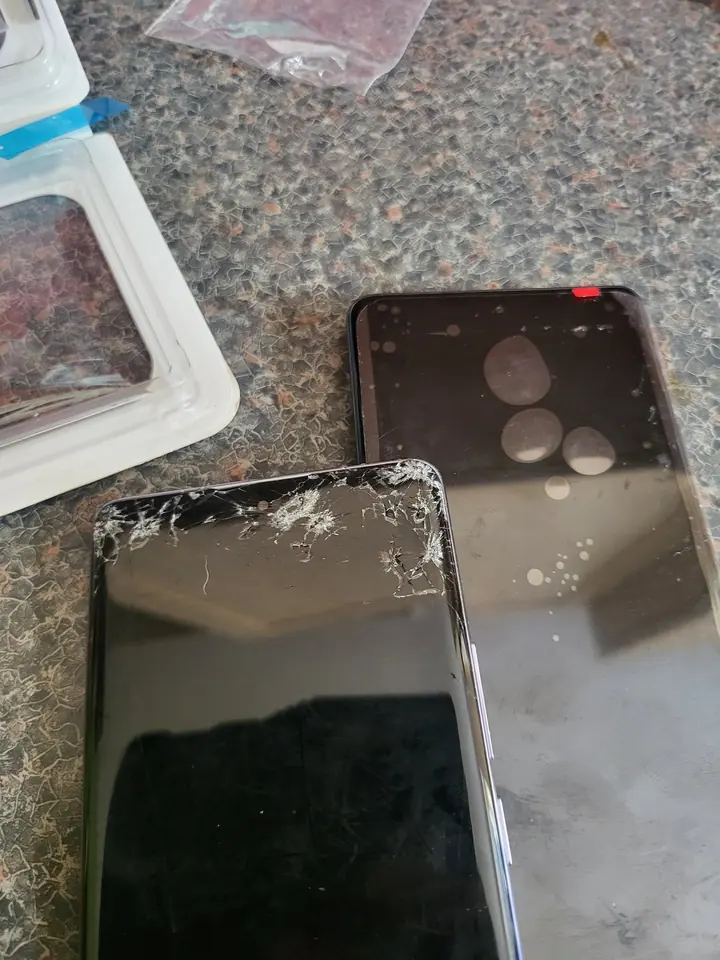 A phone during screen replacement.